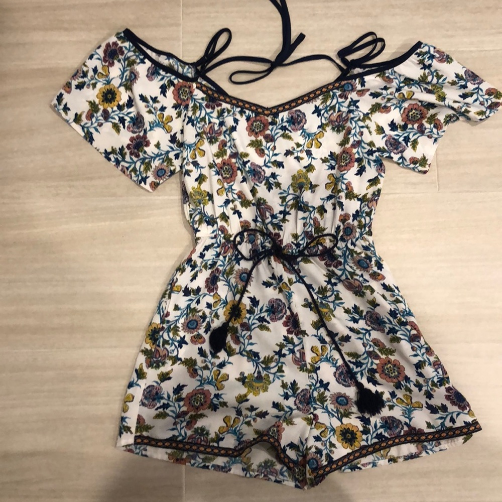 Francesca’s Blue Rain Floral Romper with pockets
